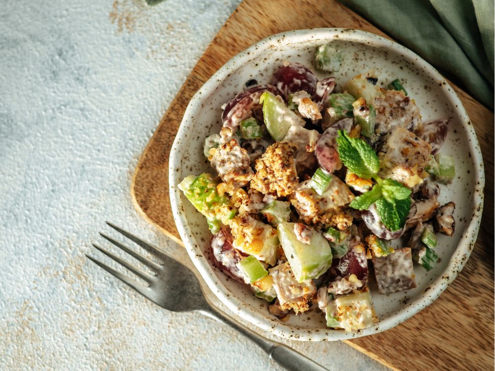 A plate of apple salad is served for breakfast.