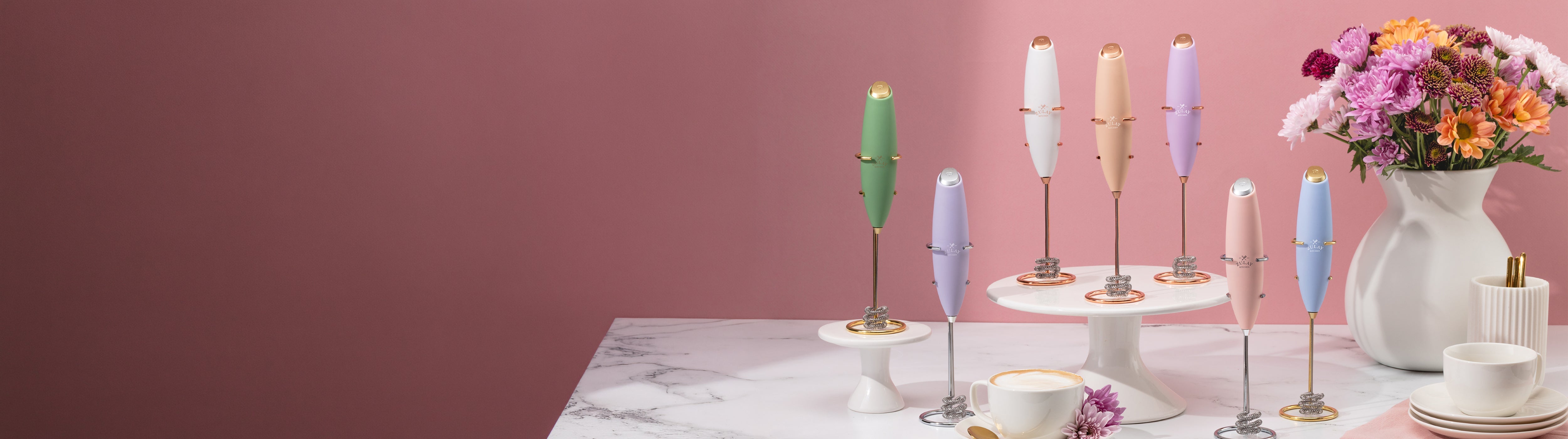 Zulay Kitchen Coffee Accessories Collection - Pouring foam from frothing pitcher into a cup of coffee.