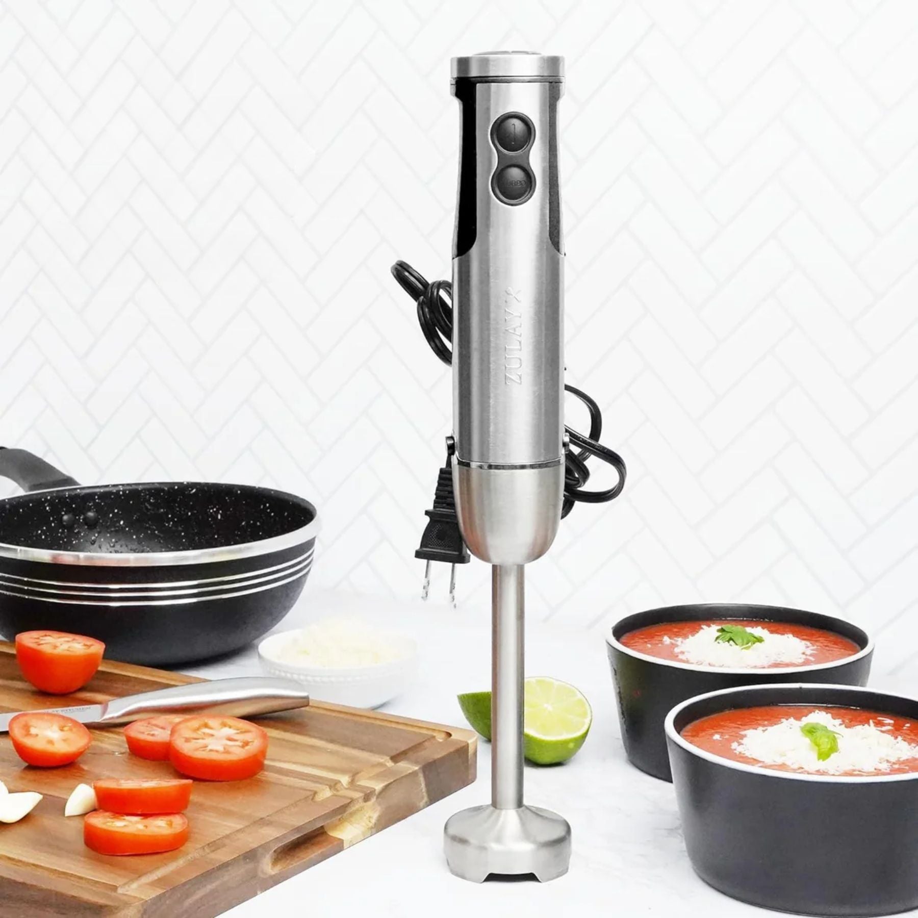 Zulay Kitchen 3-in-1 Immersion Blender on a kitchen counter with ingredients and bowls.