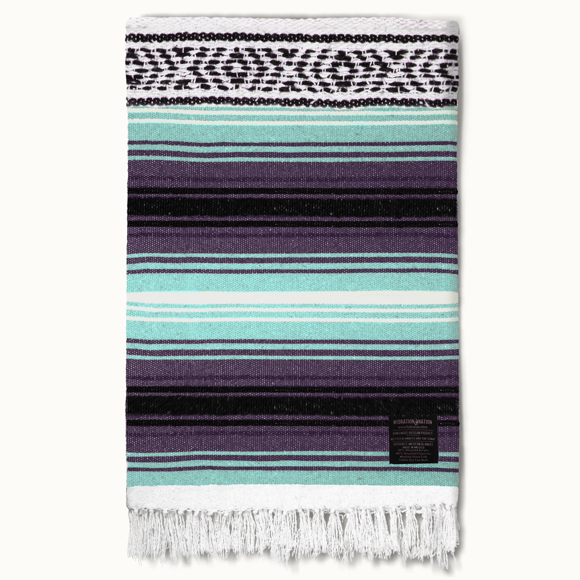 Hydration Nation Handcrafted Mexican Blanket Kitchen Striped blanket with black, purple, and turquoise pattern on a white background
