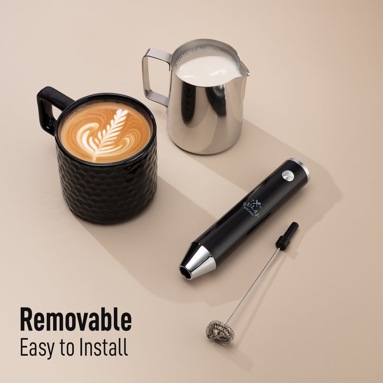 Rechrageable milk frother (black) with a cup of coffee and frothy milk
by Zulay Kitchen