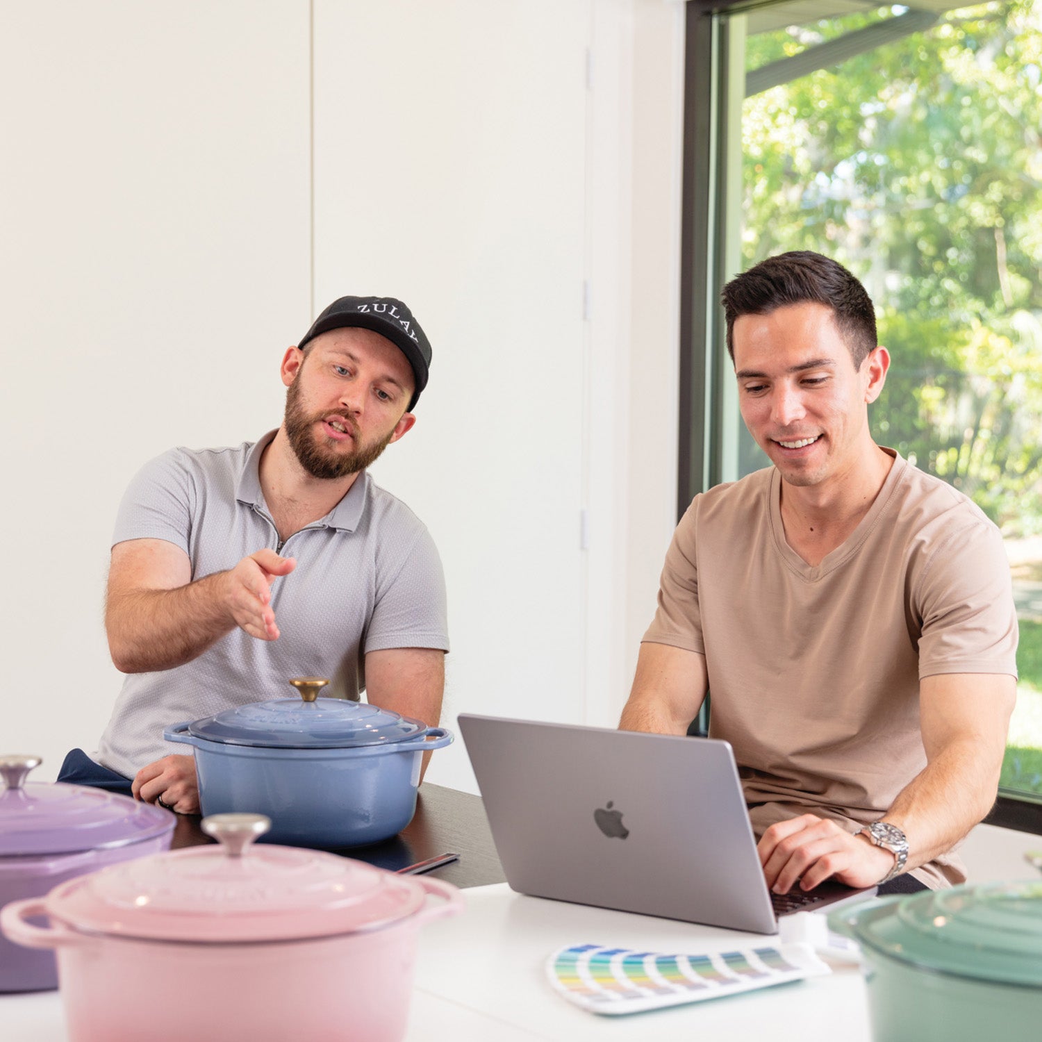 Two men doing a research for Zulay Kitchen.