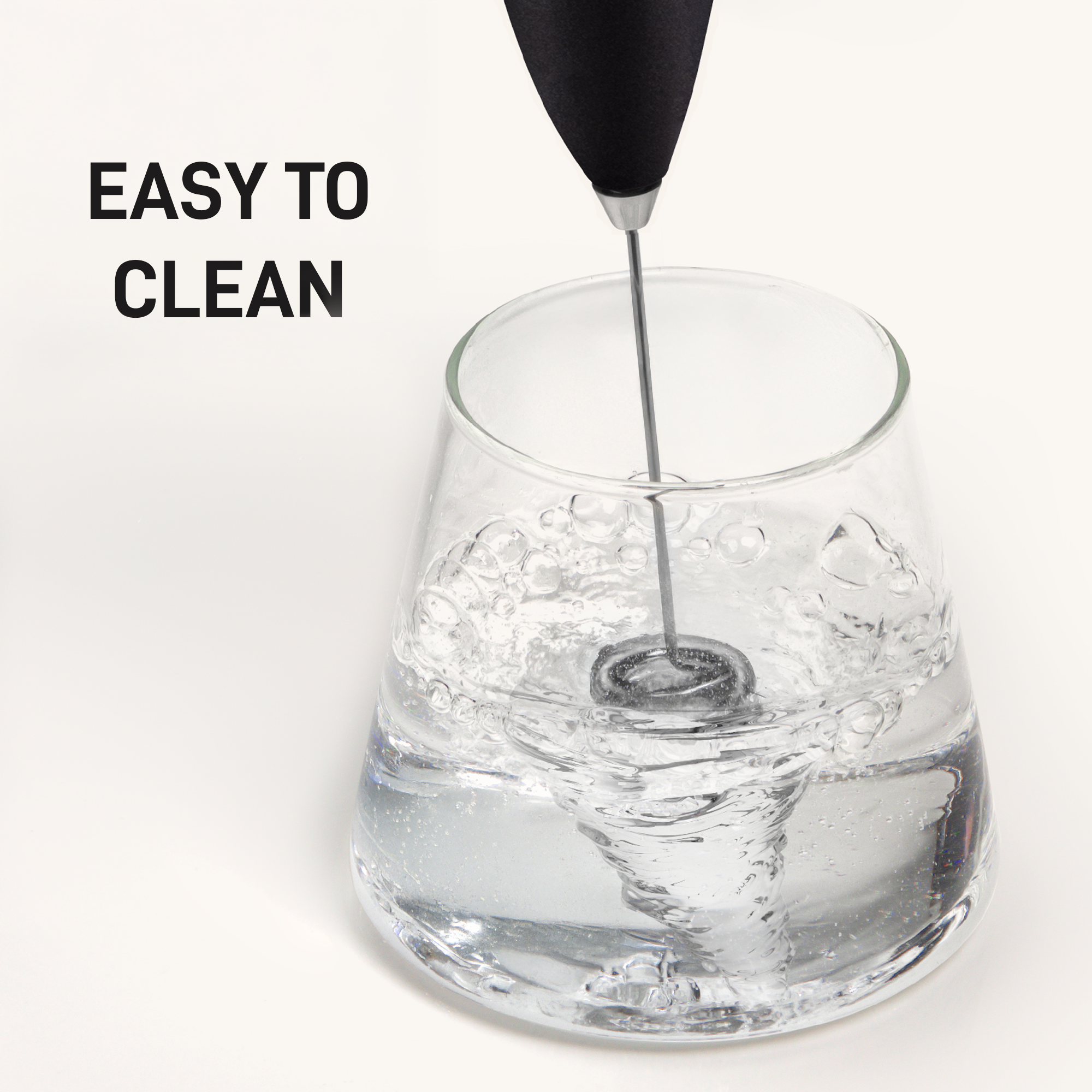 Zulay Kitchen milk frother in a jar of water