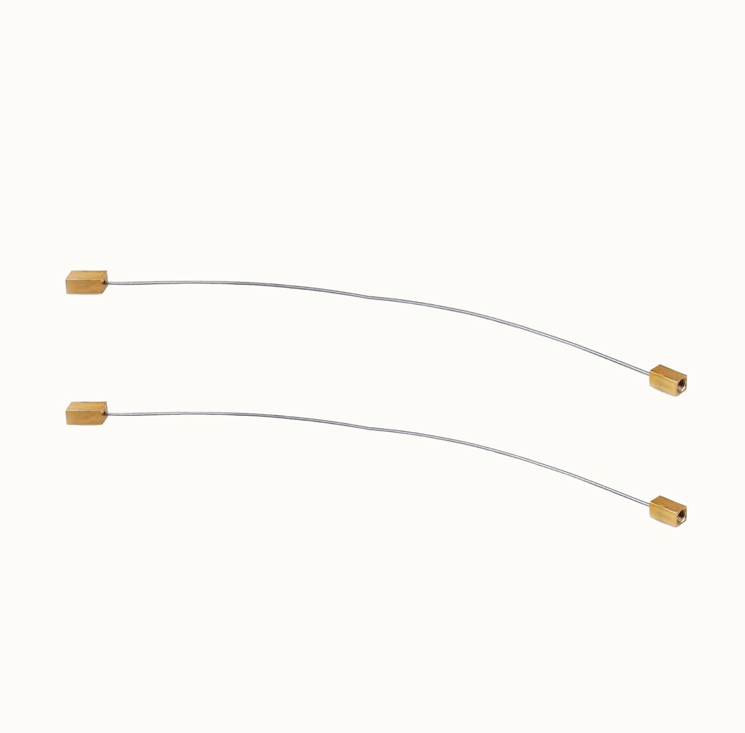 Two curved metal rods with gold ends on a white background