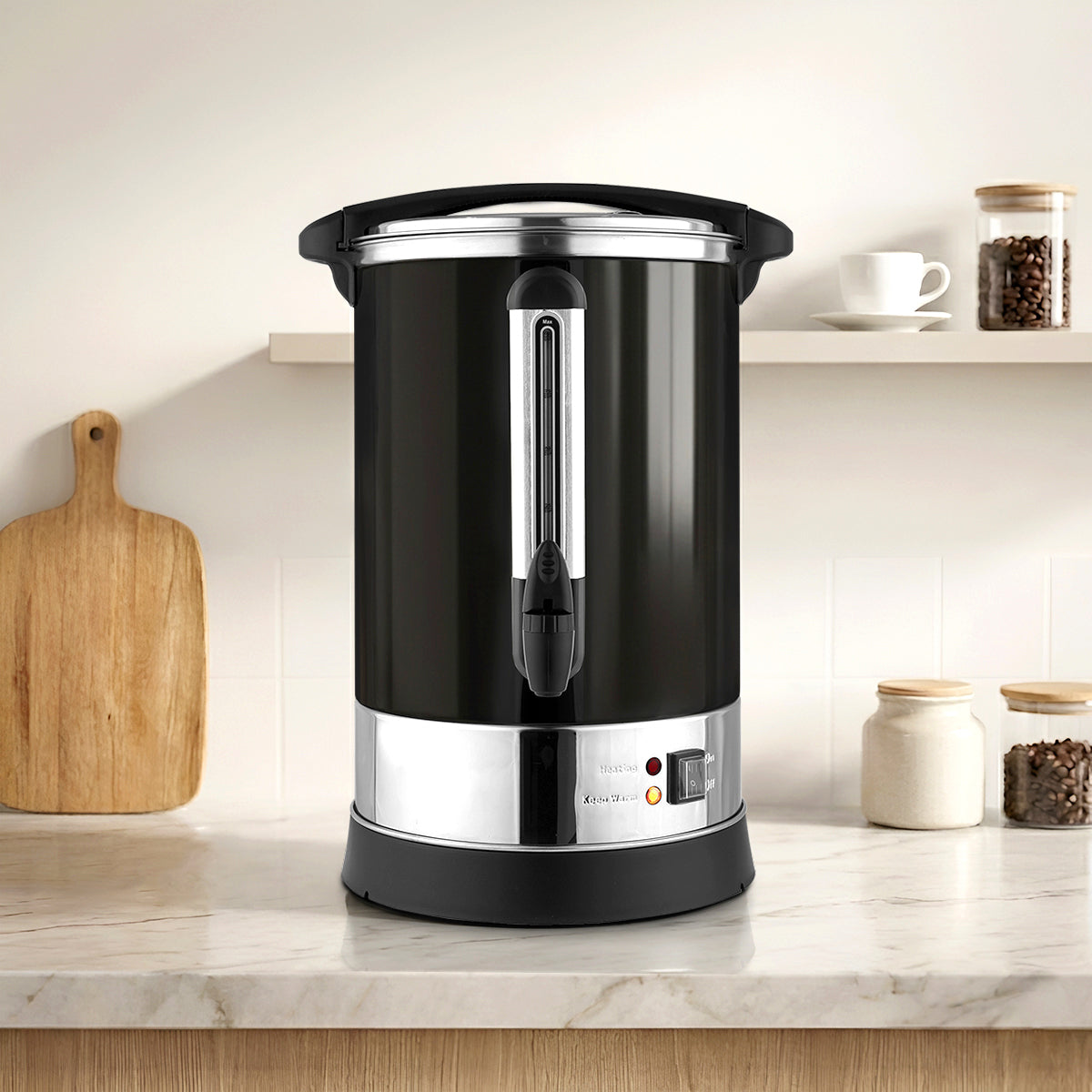 Black and silver Zulay Kitchen coffee urn on a marble countertop with a neutral background