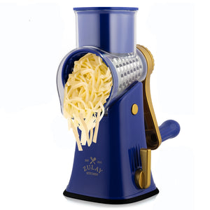 Blue rotary cheese grater with cheese on a white background