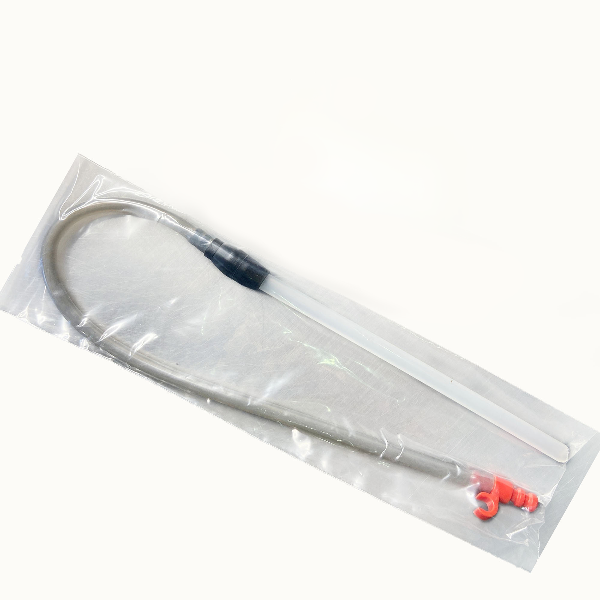 Magia White Lux Milk System UL Plug component in clear packaging on a white background