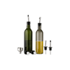 Two bottles of olive oil on a kitchen counter with a salad and ingredients.