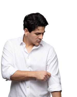 Marcelo wearing a white polo on a white background