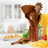 teak wood utensil set on a kitchen counter