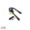 Black garlic press with minced garlic, cleaning brush, and peeler on a white background, featuring the ZUKI brand.