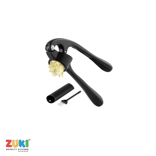 Black garlic press with minced garlic, cleaning brush, and peeler on a white background, featuring the ZUKI brand.