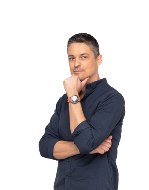 Gabe wearing a dark blue shirt with a watch on his wrist, posing against a white background
