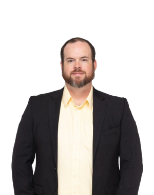 Gavin wearing a black blazer over a yellow shirt on a white background
