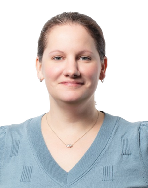 Maren wearing a light blue sweater against a white background