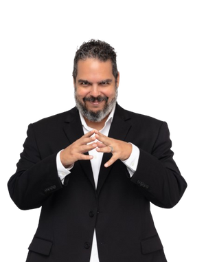 Michael in a black suit with a white shirt on a white background