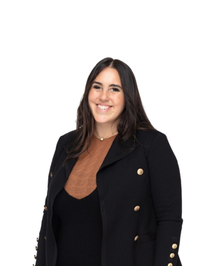 Whitney wearing a black coat with gold buttons on a white background